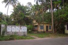 7cent Road frontage beautiful plot and small house in kottuvally village , ernakulam